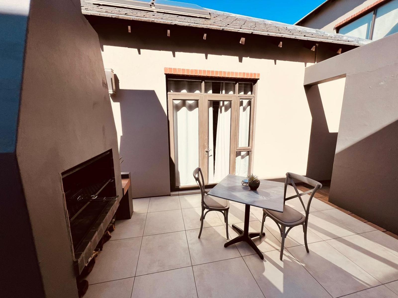 Tredenham Boutique Hotel Bloemfontein Exterior photo A braai area